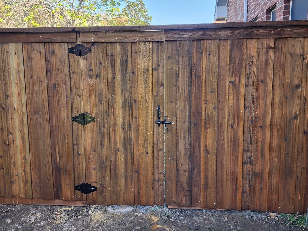 Cedar privacy fence double gate with black hardware