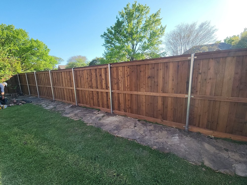 Cedar privacy fence with galvanized steel posts, backyard run