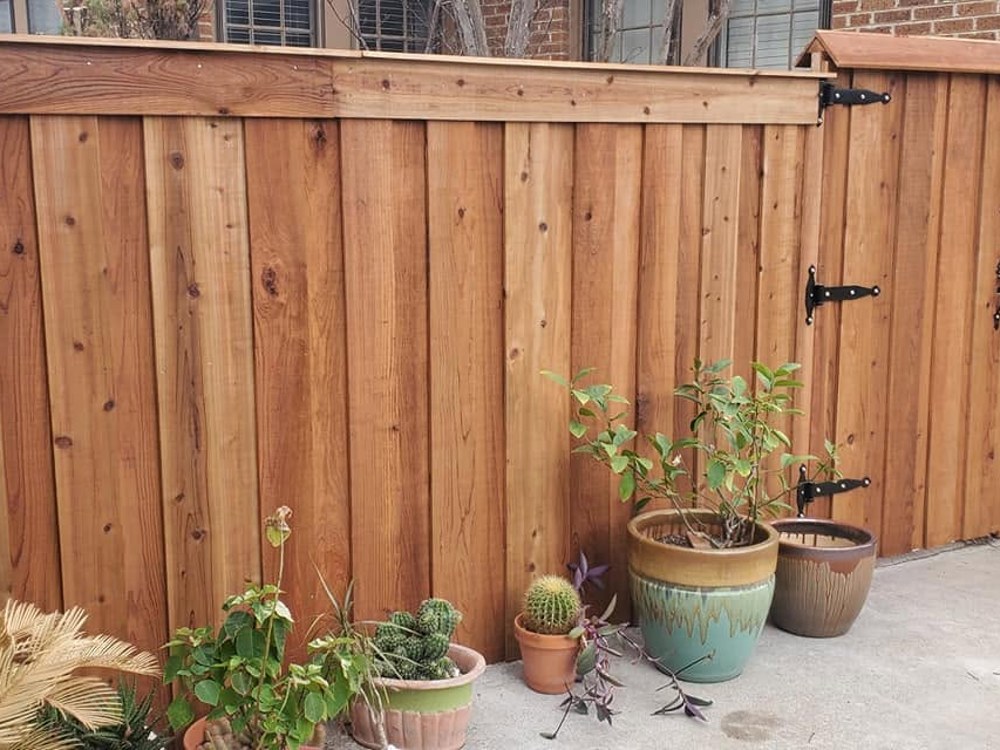 Cedar privacy fence with cap and gate, patio view