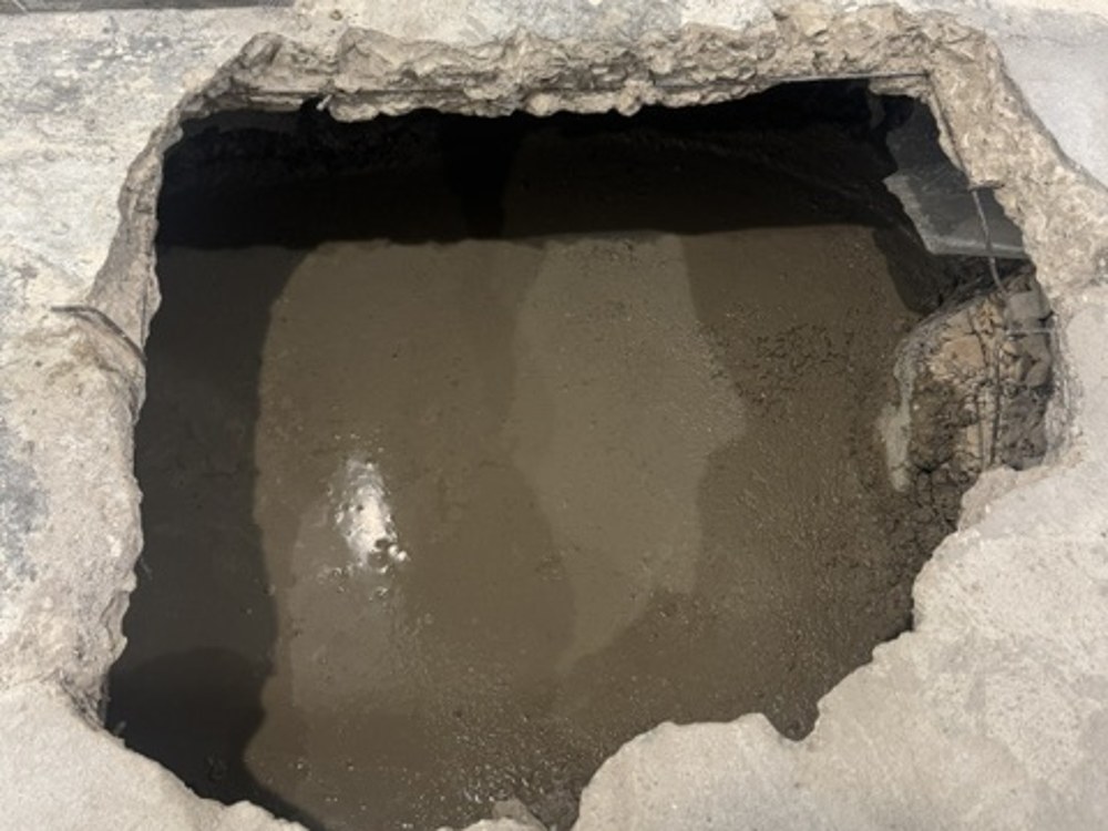New concrete poured into slab opening