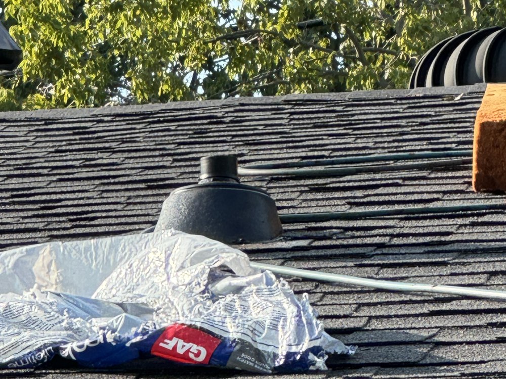 Roofing material and underlayment during installation